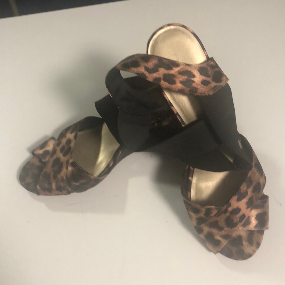 Cute animal print wedges with elastic ankle straps.